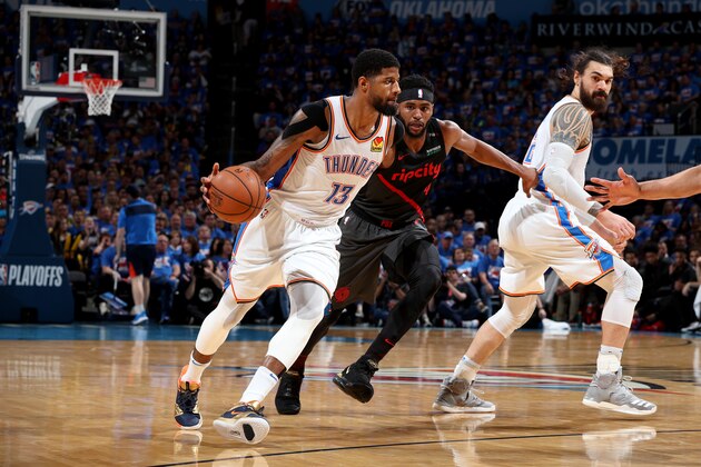 OKLAHOMA CITY, OK - APRIL 21: Paul George #13 of the Oklahoma City Thunder handles the ball during the game against the Portland Trail Blazers during Game Four of Round One of the 2019 NBA Playoffs on April 21, 2019 at Chesapeake Energy Arena in Oklahoma City, Oklahoma. NOTE TO USER: User expressly acknowledges and agrees that, by downloading and/or using this photograph, user is consenting to the terms and conditions of the Getty Images License Agreement. Mandatory Copyright Notice: Copyright 2019 NBAE (Photo by Zach Beeker/NBAE via Getty Images)