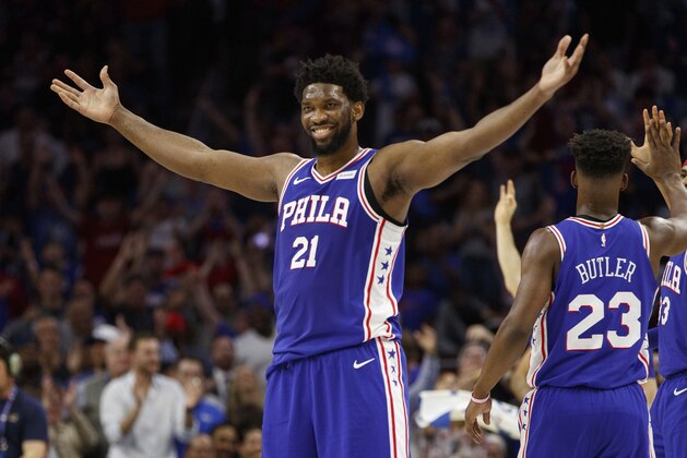 Philadelphia 76ers' Joel Embiid, of Cameroon, reacts to his basket during the first half in Game 5 of a first-round NBA basketball playoff series against the Brooklyn Nets, Tuesday, April 23, 2019, in Philadelphia. (AP Photo/Chris Szagola)