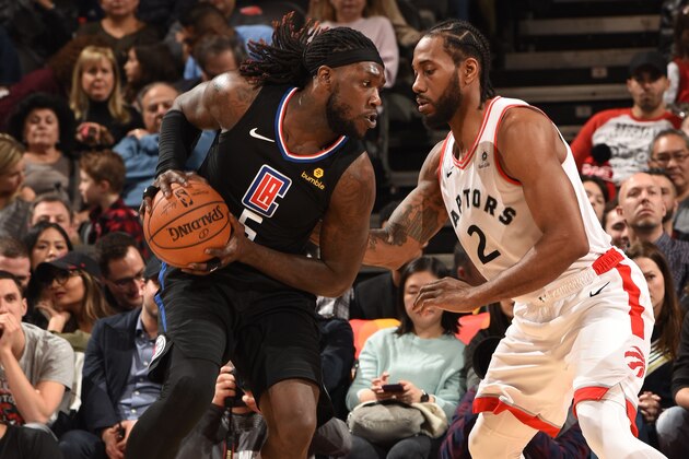 TORONTO, CANADA - FEBRUARY 3: Montrezl Harrell #5 of the LA Clippers posts up on Kawhi Leonard #2 of the Toronto Raptors on February 3, 2019 at the Scotiabank Arena in Toronto, Ontario, Canada.  NOTE TO USER: User expressly acknowledges and agrees that, by downloading and or using this Photograph, user is consenting to the terms and conditions of the Getty Images License Agreement.  Mandatory Copyright Notice: Copyright 2019 NBAE (Photo by Ron Turenne/NBAE via Getty Images)