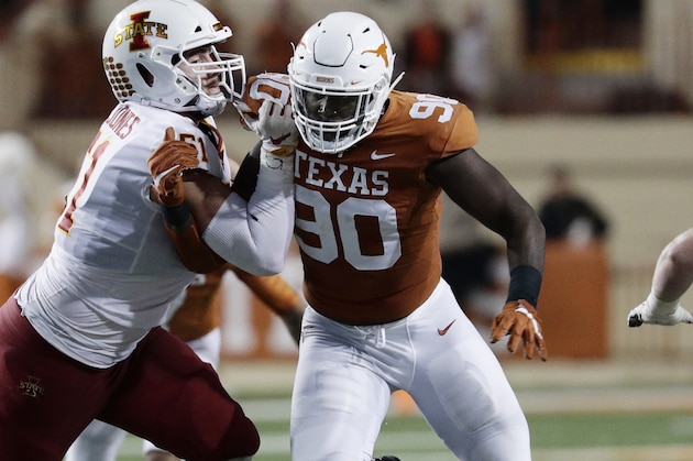Texas defensive lineman Charles Omenihu (90) during the first half of an NCAA college football game against Iowa State , Saturday, Nov. 17, 2018, in Austin, Texas. (AP Photo/Eric Gay)