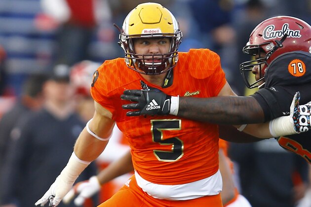 North defensive end John Cominsky of Charleston (5) tries to get around South offensive tackle Dennis Daley of South Carolina (78) during the second half of the Senior Bowl college football game, Saturday, Jan. 26, 2019, in Mobile, Ala. (AP Photo/Butch Dill)