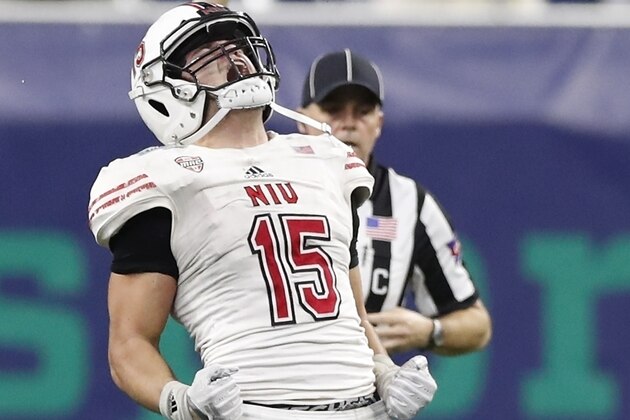 FILE - In this Nov. 30, 2018, file photo, Northern Illinois defensive end Sutton Smith (15) reacts after sacking Buffalo quarterback Tyree Jackson (3) during the second half of the Mid-American Conference championship game, in Detroit. Smith was named to the 2018 AP All-America NCAA college football team, Monday, Dec. 10, 2018.(AP Photo/Carlos Osorio, File)
