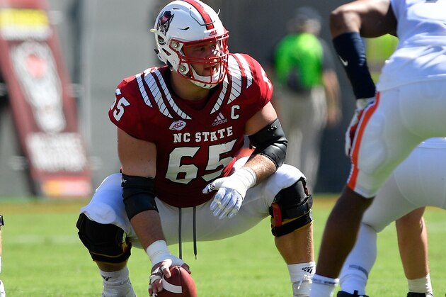 RALEIGH, NC - SEPTEMBER 29: Garrett Bradbury #65 of the North Carolina State Wolfpack prepares to snap the ball against the Virginia Cavaliers at Carter-Finley Stadium on September 29, 2018 in Raleigh, North Carolina. NC State won 35-21. (Photo by Lance King/Getty Images)