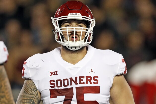 Oklahoma's Dru Samia (75) runs onto the field during the first half of an NCAA college football game against Texas Tech, Saturday, Nov. 3, 2018, in Lubbock, Texas. (AP Photo/Brad Tollefson)