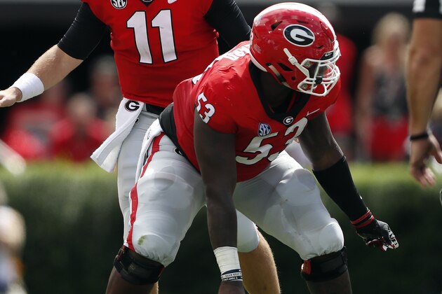 Georgia quarterback Jake Fromm (11) c alls signals as he sets under Georgia center Lamont Gaillard (53) in the first half of an NCAA college football game against Middle Tennessee Saturday, Sept. 15, 2018, in Athens, Ga. (AP Photo/John Bazemore)