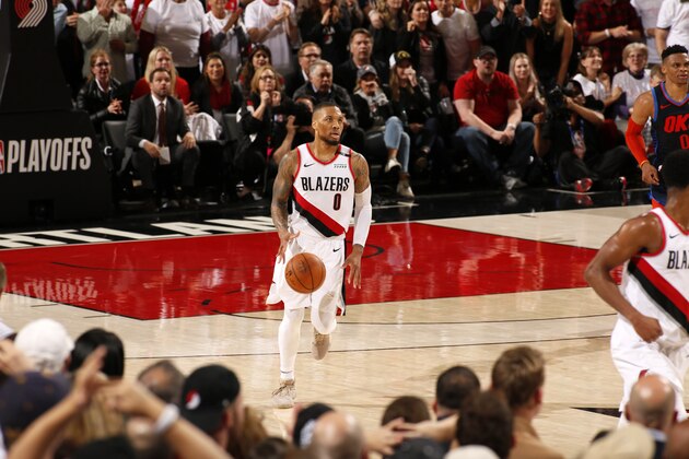 PORTLAND, OR - APRIL 23: Damian Lillard #0 of the Portland Trail Blazers handles the ball against the Oklahoma City Thunder during Game Five Round One of the 2019 NBA Playoffs on April 23, 2019 at the Moda Center in Portland, Oregon. NOTE TO USER: User expressly acknowledges and agrees that, by downloading and or using this Photograph, user is consenting to the terms and conditions of the Getty Images License Agreement. Mandatory Copyright Notice: Copyright 2019 NBAE (Photo by Cameron Browne/NBAE via Getty Images)