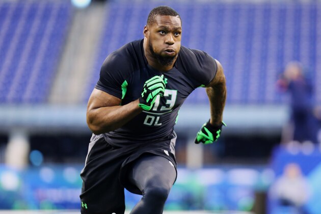 FILE - In this Feb. 28, 2016, file photo, Baylor defensive lineman Shawn Oakman performs a drill at the NFL football scouting combine in Indianapolis. Former Baylor University President Ken Starr told the Waco Tribune-Herald that he hosted a fundraiser at his home for the legal defense fund of Shawn Oakman, a former star defensive end for the Bears who was acquitted of rape last month. Starr was fired as Baylor's president in 2016, after an investigation determined there was a