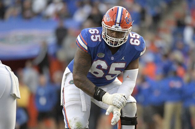 Florida offensive lineman Jawaan Taylor (65) sets up to block against Missouri defensive lineman Akial Byers, left, during the second half of an NCAA college football game Saturday, Nov. 3, 2018, in Gainesville, Fla. Missouri won 38-17. (AP Photo/Phelan M. Ebenhack)
