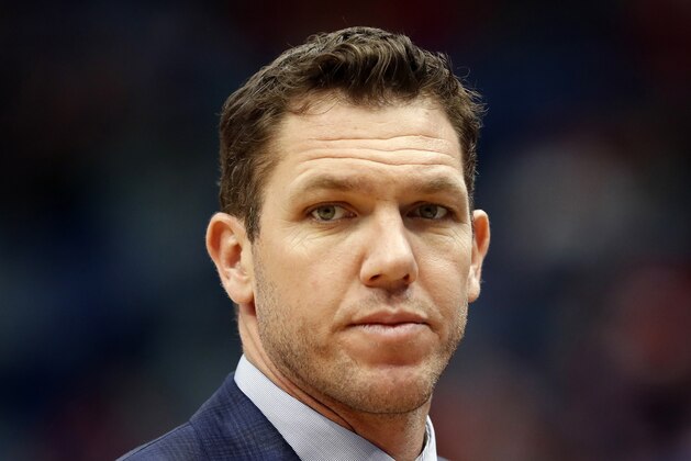FILE - In this March 31, 2019, file photo, Los Angeles Lakers head coach Luke Walton looks on during the first half of an NBA basketball game in New Orleans. The Sacramento Kings have hired Luke Walton as their coach just days after he parted ways with the Los Angeles Lakers following three losing seasons. The Kings announced Monday, April 15, 2019, that Walton will replace Dave Joerger. (AP Photo/Tyler Kaufman, File)