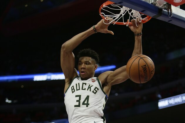 DETROIT, MI - APRIL 22:  Giannis Antetokounmpo #34 of the Milwaukee Bucks dunks against the Detroit Pistons during the second half of Game Four of the first round of the 2019 NBA Eastern Conference Playoffs at Little Caesars Arena on April 22, 2019 in Detroit, Michigan. Antetokounmpo scored 41 points in a 127-104 win over the Pistons. NOTE TO USER: User expressly acknowledges and agrees that, by downloading and or using this photograph, User is consenting to the terms and conditions of the Getty Images License Agreement. (Photo by Duane Burleson/Getty Images)