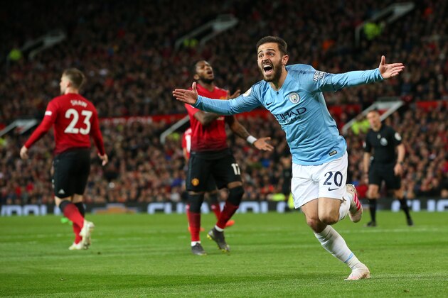 MANCHESTER, ENGLAND - APRIL 24:  Bernardo Silva of Manchester City celebrates after scoring the opening goal during the Premier League match between Manchester United and Manchester City at Old Trafford on April 24, 2019 in Manchester, United Kingdom. (Photo by Alex Livesey - Danehouse/Getty Images )