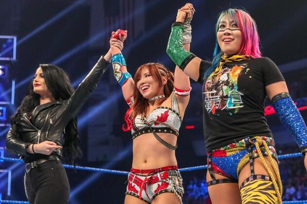 Paige with Kairi Sane (center) and Asuka