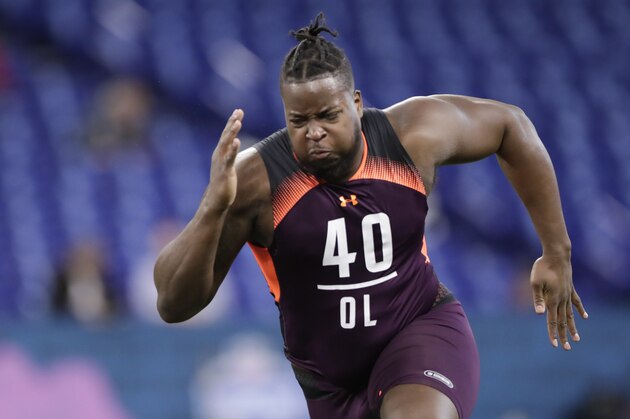 Morgan State offensive lineman Joshua Miles runs a drill at the NFL football scouting combine in Indianapolis, Friday, March 1, 2019. (AP Photo/Michael Conroy)