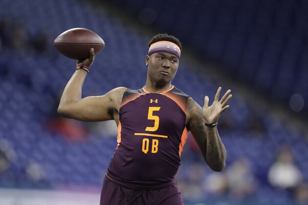 Ohio State quarterback Dwayne Haskins runs a drill during the NFL football scouting combine, Saturday, March 2, 2019, in Indianapolis. (AP Photo/Darron Cummings)