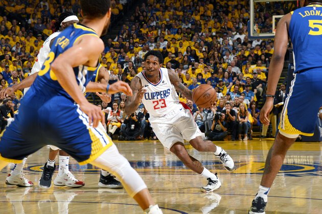 OAKLAND, CA - APRIL 24: Lou Williams #23 of the LA Clippers handles the ball against the Golden State Warriors during Game Five of Round One of the 2019 NBA Playoffs on April 24, 2019 at ORACLE Arena in Oakland, California. NOTE TO USER: User expressly acknowledges and agrees that, by downloading and/or using this photograph, user is consenting to the terms and conditions of Getty Images License Agreement. Mandatory Copyright Notice: Copyright 2019 NBAE (Photo by Noah Graham/NBAE via Getty Images)