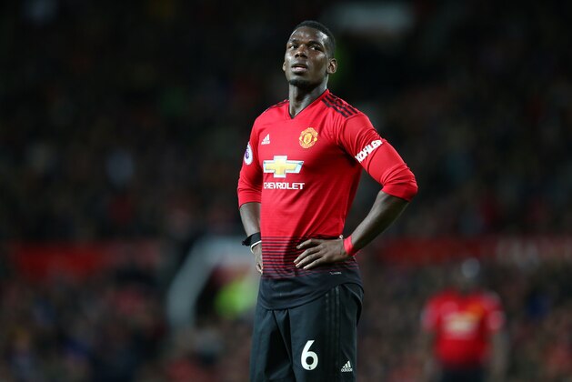 MANCHESTER, ENGLAND - APRIL 24:  Paul Pogba of Manchester United looks on during the Premier League match between Manchester United and Manchester City at Old Trafford on April 24, 2019 in Manchester, United Kingdom. (Photo by Alex Livesey - Danehouse/Getty Images )