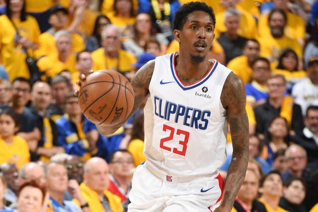 OAKLAND, CA - APRIL 24: Lou Williams #23 of the LA Clippers handles the ball against the Golden State Warriors  during Game Five of Round One of the 2019 NBA Playoffs on April 24, 2019 at ORACLE Arena in Oakland, California. NOTE TO USER: User expressly acknowledges and agrees that, by downloading and or using this photograph, user is consenting to the terms and conditions of Getty Images License Agreement. Mandatory Copyright Notice: Copyright 2019 NBAE (Photo by Andrew D. Bernstein/NBAE via Getty Images)