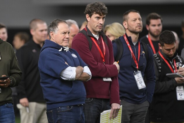New England Patriot coach Bill Belichick, left, watches a football drill during Georgia Pro Day, Wednesday, March 20, 2019, in Athens, Ga. (AP Photo/John Amis)