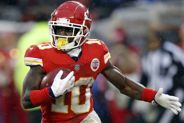 Kansas City Chiefs wide receiver Tyreek Hill (10) carries the ball during the first half of an NFL divisional football playoff game against the Indianapolis Colts in Kansas City, Mo., Saturday, Jan. 12, 2019. (AP Photo/Charlie Neibergall)