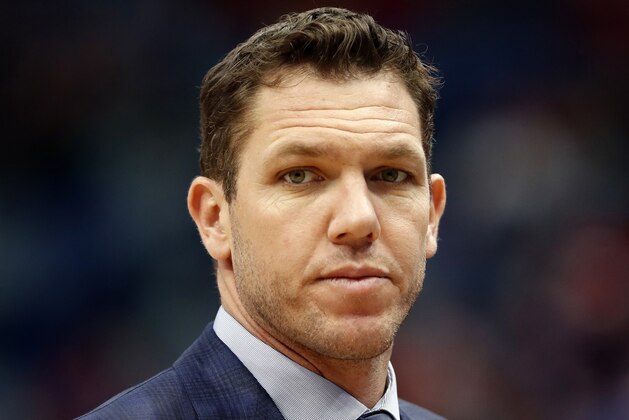 FILE - In this March 31, 2019, file photo, Los Angeles Lakers head coach Luke Walton looks on during the first half of an NBA basketball game in New Orleans. The Sacramento Kings have hired Luke Walton as their coach just days after he parted ways with the Los Angeles Lakers following three losing seasons. The Kings announced Monday, April 15, 2019, that Walton will replace Dave Joerger. (AP Photo/Tyler Kaufman, File)