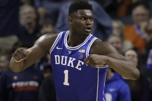 Duke's Zion Williamson (1) reacts after scoring against North Carolina during the second half of an NCAA college basketball game in the Atlantic Coast Conference tournament in Charlotte, N.C., Friday, March 15, 2019. (AP Photo/Chuck Burton)