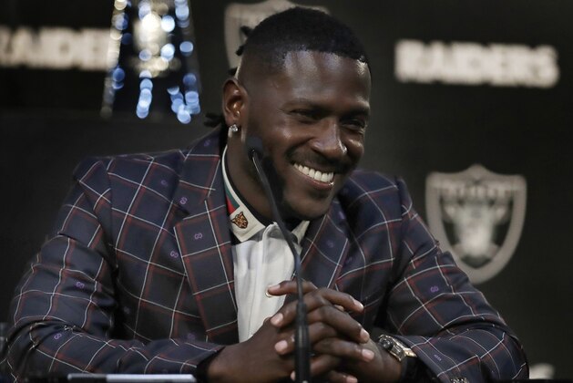Oakland Raiders wide receiver Antonio Brown smiles during an NFL football news conference, Wednesday, March 13, 2019, in Alameda, Calif. (AP Photo/Ben Margot)