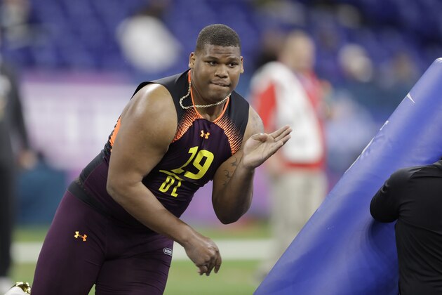 Alabama defensive lineman Quinnen Williams runs a drill during the NFL football scouting combine, Sunday, March 3, 2019, in Indianapolis. (AP Photo/Darron Cummings)
