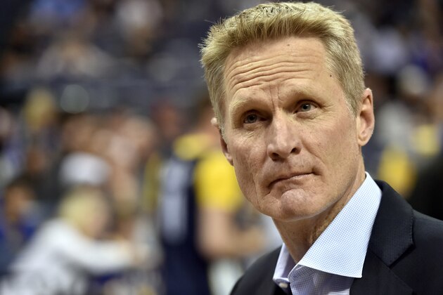 Golden State Warriors head coach Steve Kerr stands on the court before an NBA basketball game against the Memphis Grizzlies Wednesday, March 27, 2019, in Memphis, Tenn. (AP Photo/Brandon Dill)
