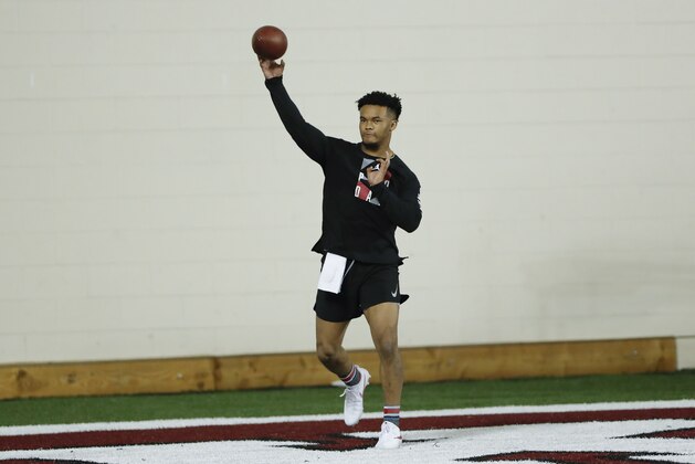 Oklahoma quarterback Kyler Murray goes through passing drills at the university's Pro Day for NFL scouts in Norman, Okla., Wednesday, March 13, 2019. (AP Photo/Alonzo Adams)