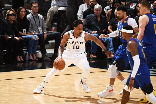 SAN ANTONIO, TX - APRIL 25: DeMar DeRozan #10 of the San Antonio Spurs handles the ball against the Denver Nuggets during Game Six of Round One during the 2019 NBA Playoffs on April 25, 2019 at the AT&T Center in San Antonio, Texas. NOTE TO USER: User expressly acknowledges and agrees that, by downloading and/or using this photograph, user is consenting to the terms and conditions of the Getty Images License Agreement. Mandatory Copyright Notice: Copyright 2019 NBAE (Photos by Garrett Ellwood/NBAE via Getty Images)