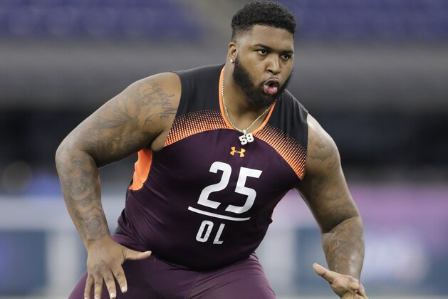 Alabama State offensive lineman Tytus Howard runs a drill during the NFL football scouting combine, Friday, March 1, 2019, in Indianapolis. (AP Photo/Darron Cummings)