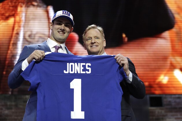 Duke quarterback Daniel Jones poses with NFL Commissioner Roger Goodell after the New York Giants selected Jones in the first round at the NFL football draft, Thursday, April 25, 2019, in Nashville, Tenn. (AP Photo/Mark Humphrey)