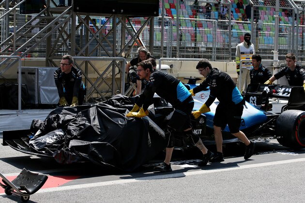 BAKU, AZERBAIJAN - APRIL 26: The broken car of George Russell of Great Britain and Williams is pushed down the pitlane after stopping on track during practice for the F1 Grand Prix of Azerbaijan at Baku City Circuit on April 26, 2019 in Baku, Azerbaijan. (Photo by Charles Coates/Getty Images)