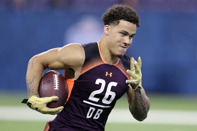 FILE - In this March 4, 2019, file photo, Washington defensive back Byron Murphy runs a drill during the NFL football scouting combine, in Indianapolis. Murphy is a possible pick in the 2019 NFL Draft. (AP Photo/Darron Cummings, File)