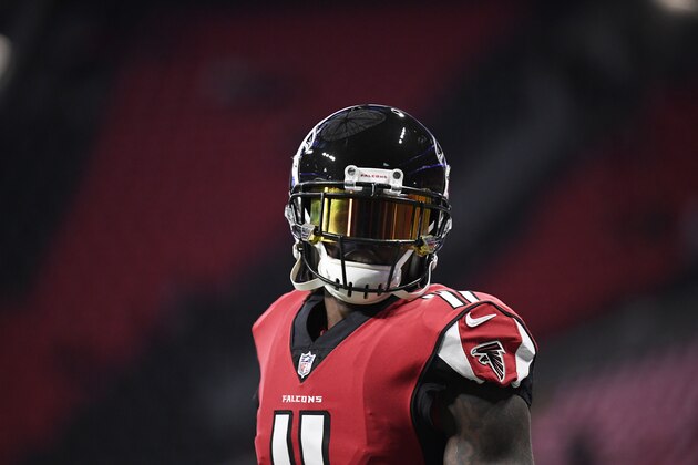 Atlanta Falcons wide receiver Julio Jones (11) warms up before the first half of an NFL football game against the Arizona Cardinals, Sunday, Dec. 16, 2018, in Atlanta. (AP Photo/Danny Karnik)