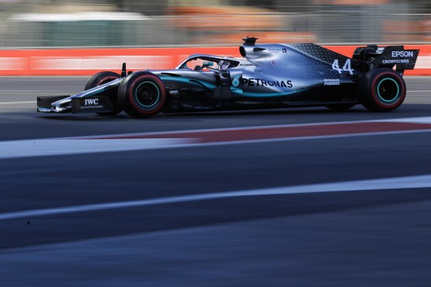 Mercedes driver Lewis Hamilton of Britain steers his car during the second free practice at the Baku Formula One city circuit in Baku, Azerbaijan, Friday, April 26, 2019. The Azerbaijan F1 Grand Prix race will be held on Sunday. (AP Photo/Sergei Grits)