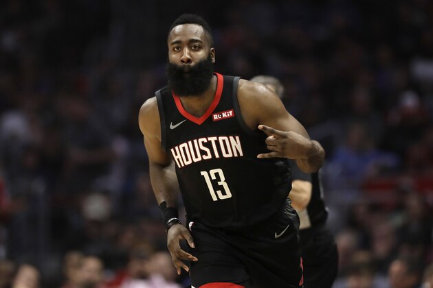 Houston Rockets' James Harden (13) reacts after making a 3-point basket against the Los Angeles Clippers during the first half of an NBA basketball game Wednesday, April 3, 2019, in Los Angeles. (AP Photo/Marcio Jose Sanchez)
