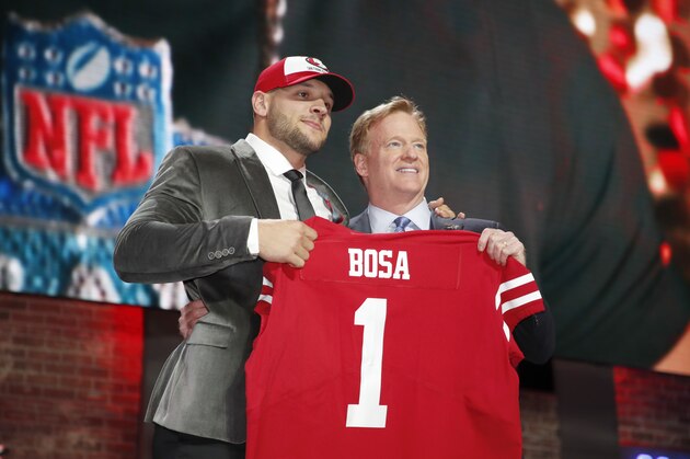 Ohio State defensive end Nick Bosa poses with NFL Commissioner Roger Goodell after the San Francisco 49ers selected Bosa in the first round at the NFL football draft, Thursday, April 25, 2019, in Nashville, Tenn. (Jeff Haynes/AP Images for Panini)