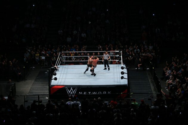 Wrestlers fight during a show at the AccorHotels Arena in Paris, as part of the WrestleMania Revenge Tour, the World Wrestling Entertainment (WWE) European tour, on April 22, 2016.  / AFP / THOMAS SAMSON        (Photo credit should read THOMAS SAMSON/AFP/Getty Images)
