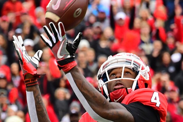 ATHENS, GA - NOVEMBER 24: Mecole Hardman #4 of the Georgia Bulldogs makes a catch for a second quarter touchdown against the Georgia Tech Yellow Jackets on November 24, 2018 at Sanford Stadium in Athens, Georgia. (Photo by Scott Cunningham/Getty Images)