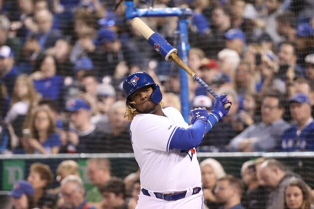 TORONTO, ON - APRIL 26: Vladimir Guerrero Jr. #27 of the Toronto Blue Jays gets ready to bat as he swings in the on-deck circle in the first inning during MLB game action against the Oakland Athletics at Rogers Centre on April 26, 2019 in Toronto, Canada. (Photo by Tom Szczerbowski/Getty Images)