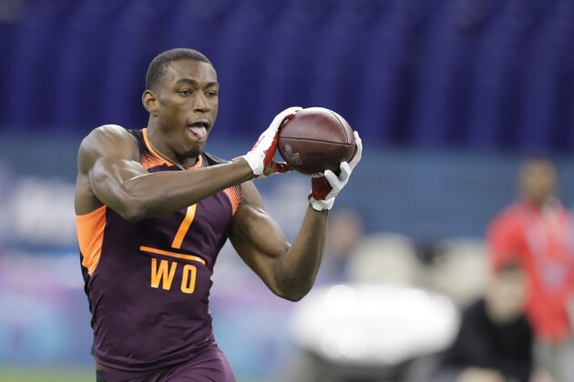 Iowa State wide receiver Hakeem Butler runs a drill during the NFL football scouting combine, Saturday, March 2, 2019, in Indianapolis. (AP Photo/Darron Cummings)