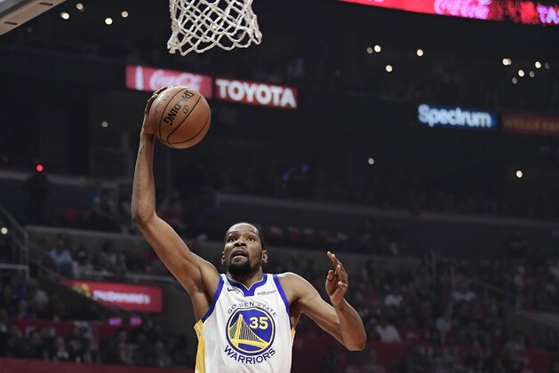 Golden State Warriors forward Kevin Durant, left, shoots as Los Angeles Clippers guard Lou Williams defends during the first half in Game 6 of a first-round NBA basketball playoff series Friday, April 26, 2019, in Los Angeles. (AP Photo/Mark J. Terrill)