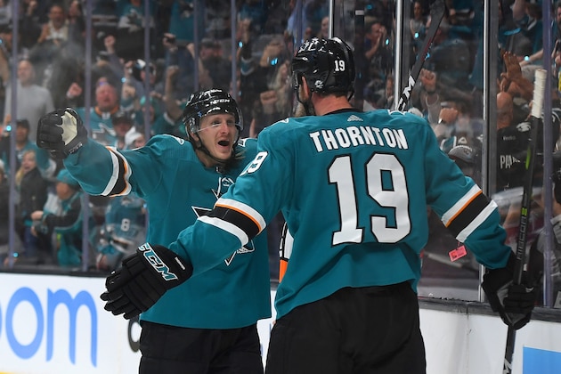 SAN JOSE, CA - APRIL 26:  Joe Thornton #19 of the San Jose Sharks is congratulated by Marcus Sorensen #20 after Thornton scored a goal against the Colorado Avalanche during the second period in Game One of the Western Conference Second Round during the 2019 NHL Stanley Cup Playoffs at SAP Center on April 26, 2019 in San Jose, California.  (Photo by Thearon W. Henderson/Getty Images )