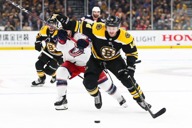 BOSTON, MA - APRIL 25:   Chris Wagner #14 of the Boston Bruins skates with the puck in Game One of the Eastern Conference Second Round against the Columbus Blue Jackets during the 2019 NHL Stanley Cup Playoffs at TD Garden on April 25, 2019 in Boston, Massachusetts. (Photo by Adam Glanzman/Getty Images)