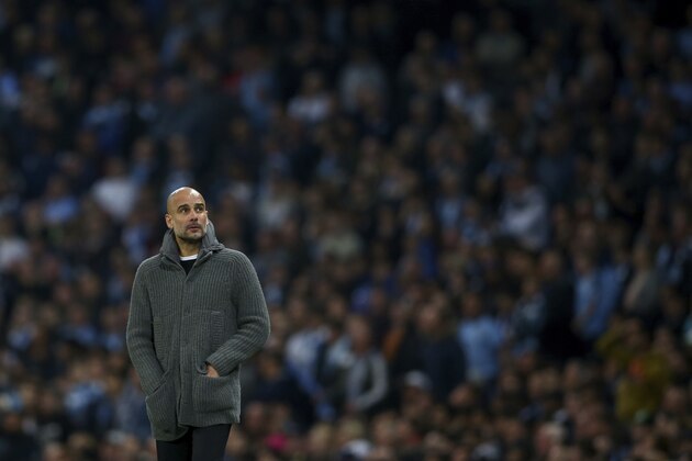 Manchester City coach Pep Guardiola looks up during the Champions League quarterfinal, second leg, soccer match between Manchester City and Tottenham Hotspur at the Etihad Stadium in Manchester, England, Wednesday, April 17, 2019. (AP Photo/Dave Thompson)