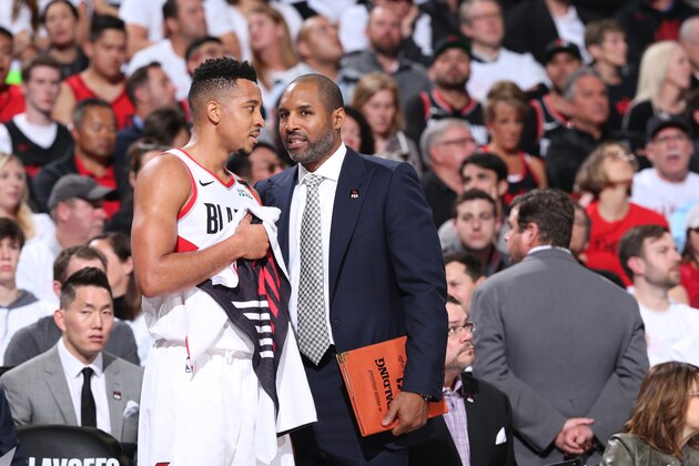 PORTLAND, OR - APRIL 23: Assistant Coach David Vanterpool speaks with CJ McCollum of the Portland Trail Blazers during Game Five of Round One of the 2019 NBA Playoffs on April 23, 2019 at the Moda Center in Portland, Oregon. NOTE TO USER: User expressly acknowledges and agrees that, by downloading and or using this Photograph, user is consenting to the terms and conditions of the Getty Images License Agreement. Mandatory Copyright Notice: Copyright 2019 NBAE (Photo by Sam Forencich/NBAE via Getty Images)