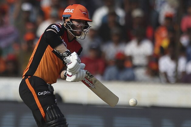 Sunrisers Hyderabad's David Warner plays a shot against Royal Challengers Bangalore during the VIVO IPL T20 cricket match in Hyderabad, India, Sunday, March 31, 2019. (AP Photo/ Mahesh Kumar A.)