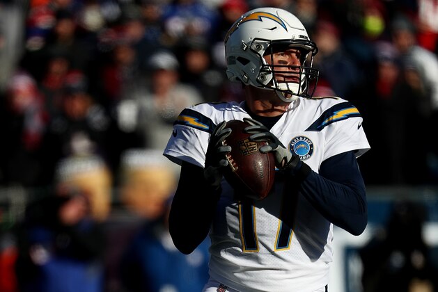 FOXBOROUGH, MASSACHUSETTS - JANUARY 13:  Philip Rivers #17 of the Los Angeles Chargers in action against the New England Patriots during their AFC Divisional Round playoff game at Gillette Stadium on January 13, 2019 in Foxborough, Massachusetts. (Photo by Al Bello/Getty Images)