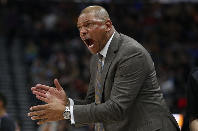 Los Angeles Clippers head coach Doc Rivers shouts to his team in the second half during an NBA basketball game against the Utah Jazz Wednesday, Feb. 27, 2019, in Salt Lake City. (AP Photo/Rick Bowmer)